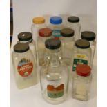 A collection of early Century chemist medicine bottles, together with eight sweet shop glass