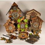 A collection of clocks to include, six cuckoo clocks