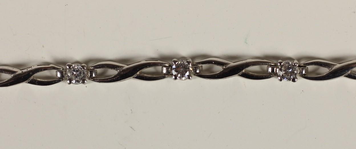 A 9ct white gold and white stone line bracelet,16.6cm, 4.4gm - Image 2 of 2