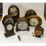 A collection of clocks to include, a Metamec quartz wall clock, a Bentima battery mantel clock,