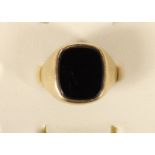 A 9ct gold and onyx signet ring, 5gm, O.
