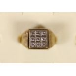 A 9ct gold diamond set panel ring, set with 9 brilliants, 4gm, L.