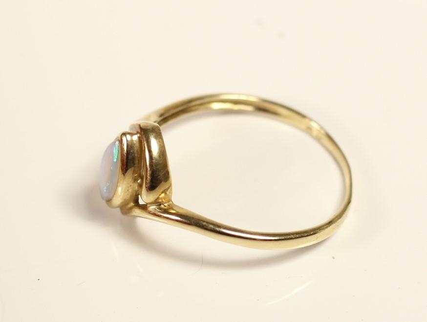 A 9ct gold and opal ring, O, a 9ct gold band ring, N 1/2, 4gm - Image 3 of 3