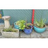 A concrete garden bird bath, 63cm tall, together with a concrete garden trough, 70cm wide, and