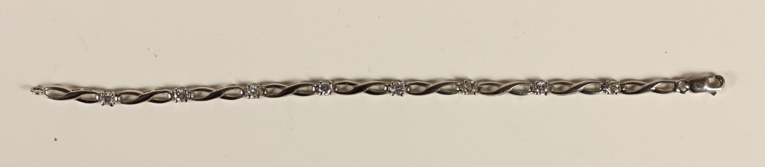 A 9ct white gold and white stone line bracelet,16.6cm, 4.4gm