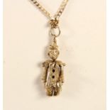 A 9ct gold articulated clown pendant, chain, 7gm