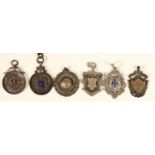 Six various silver fobs, various dates and makers, including the Royal Artillery Association