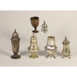 A silver octagonal baluster caster, Birmingham 1905, three other silver castors and and egg cup, 5.