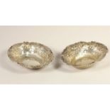 A pair of Victorian silver embossed and pierced dishes, Birmingham 1900, 12 x 10 cm, 2 oz.