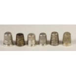 Six silver thimbles, all English, various dates and makers including Charles Horner, 1oz