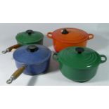 Two Le Creuset cast iron sauce pans and two Le Creuset