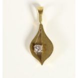 A gold and diamond pendant, tests as 18K, 1.6gm