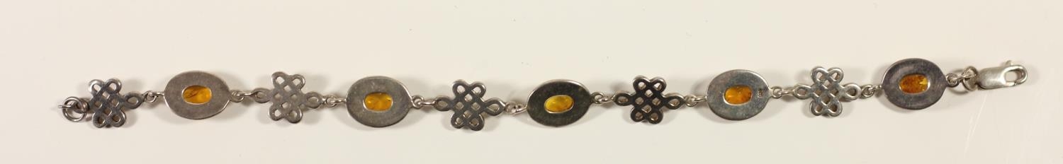 A silver and amber pendant, bracelet with matching ear rings and two pairs of ear rings - Image 4 of 7