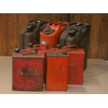 Three steel Jerry cans, together with four steel petrol cans. (7)