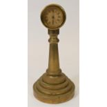 A brass pedestal mantel clock, in the style of a ships telegraph, 27 cm