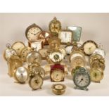 A collection of clocks to include, Big Ben Westclox, Swiza 8, Smiths and other manual wind clocks (