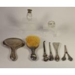 A collection of silver mounted items, to include a hair brush with cherubs amongst grape vines,