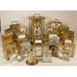 A collection of clocks to include, a Lonsdale England quartz clock, a Hermle anniversary clock, a