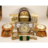 A collection of clocks to include, an Emperor quartz wall clock, a marble Xavier mantel clock, a