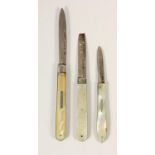 Three silver and mother of pearl fruit knives, Sheffield 1876, 1865 (lacking tip) and 1906