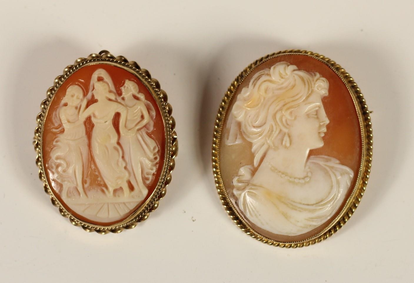 A 9ct gold mounted shell cameo brooch, depicting the Three Graces, 33 x 27mm and another depicting a