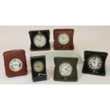 A collection of clocks to include, six 1920's style, bedside travel clocks