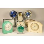 A collection of clocks to include, a Big Ben repeater Westclox manual wind, a Coral alarm clock, a