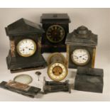 A collection of clocks to include, a slate and marble mantel clock, with a similar slate mantel