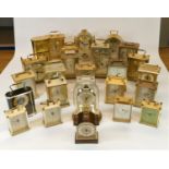 A collection of clocks to include, London Clock Co. quartz mantel clock, Timemaster Strike quartz