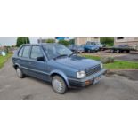 1987 Nissan Micra SGL automatic, 998cc. Registration number E549 BPU. Chassis number K10 429826.