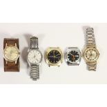 A Smiths Empire manual wind wristwatch, a Seiko quartz day/date wristwatch and three other