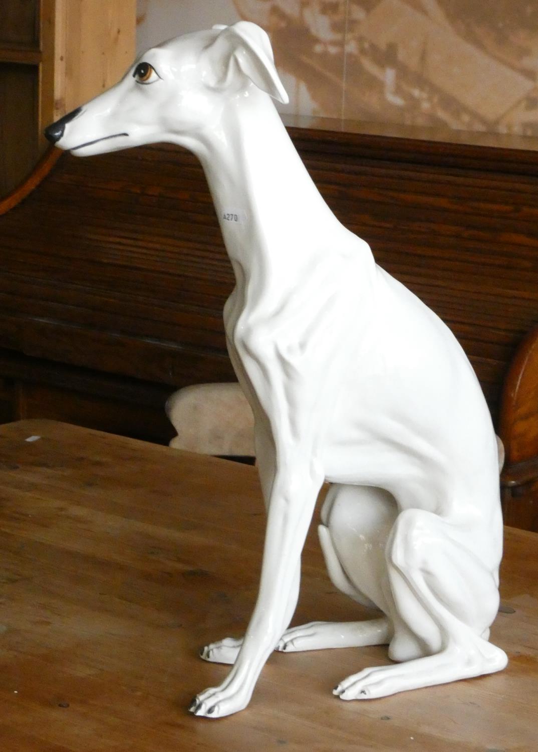 A ceramic fireside model of a seated Whippet dog. 54cm tall. - Image 2 of 3