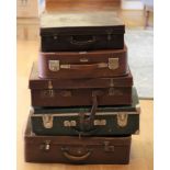 A collection of Mid Century suitcases of various sizes. (6)