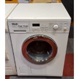 A Miele washing machine, model number WT 2780.