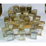 A collection of clocks to include, an Acctim quartz carriage clock, a Highlands quartz clock, a