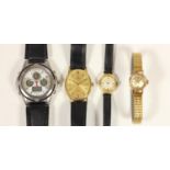 Omega, an oval gold plated oval quartz wristwatch, case, a ladies Omega manual wind wristwatch and