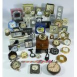 A collection of clocks to include, travel alarm clocks and others