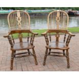 A pair of country oak farmhouse Windsor armchairs. seat height 42cm, seat depth, 42cm,