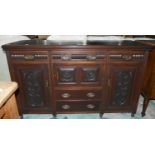 A carved mahogany sideboard, comprising of three top drawers, central cupboard flanked by