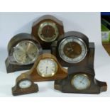 A collection of clocks to include, a Rapport, London mantel clock, together with other wooden mantel
