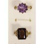 A 9ct gold and amethyst cluster ring, R and a 9ct gold and smokey quartz ring, L, 7.2gm