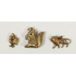 Three 9ct gold charms, squirrel, lion and cockerel, 4.9gm