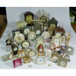 A collection of clocks to include, a Smiths sectric wall clock, a Westclox alarm clock, a Rhythm