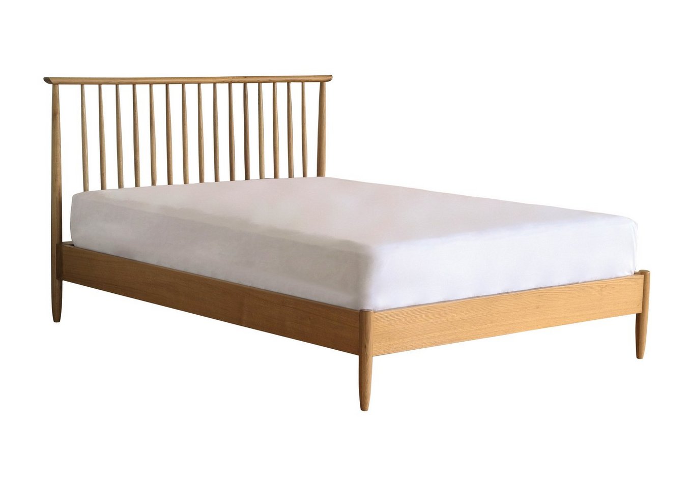 An Ercol Teramo king size bed frame, with turned and tapered spindles, handcrafted from solid pale