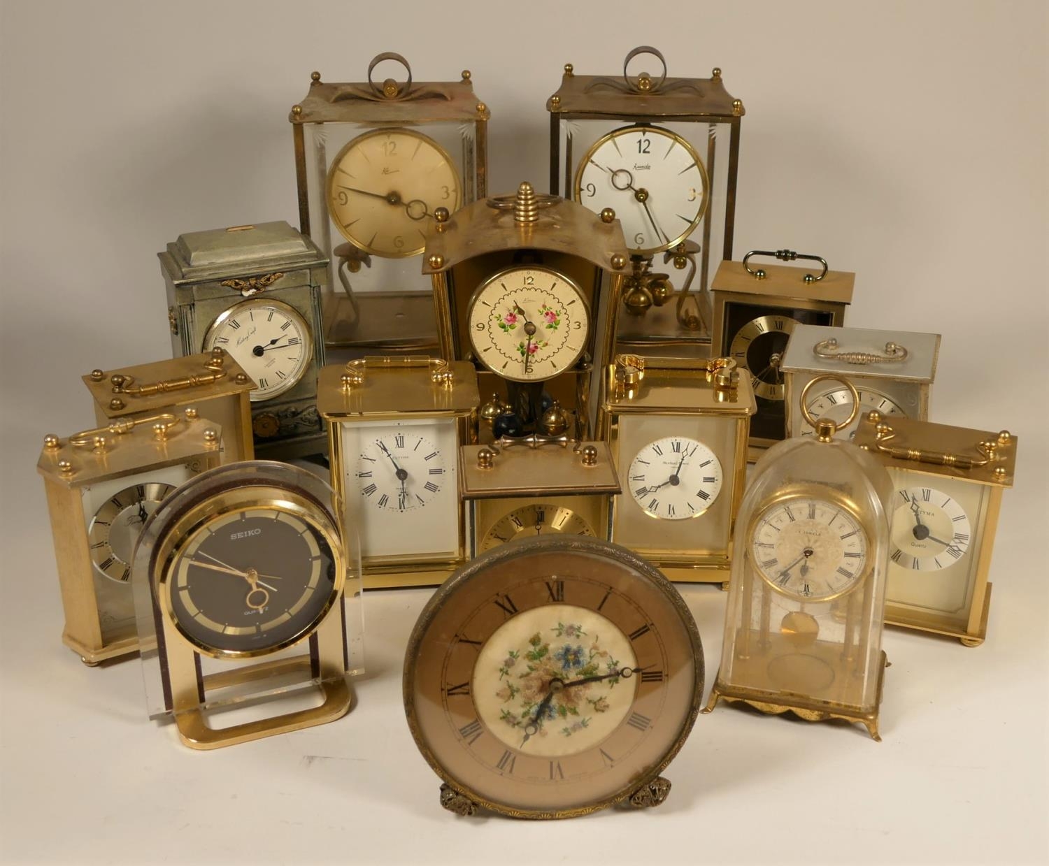 A collection of clocks to include, a Schatz anniversary clock, a Bentima 8 day mantel clock, a