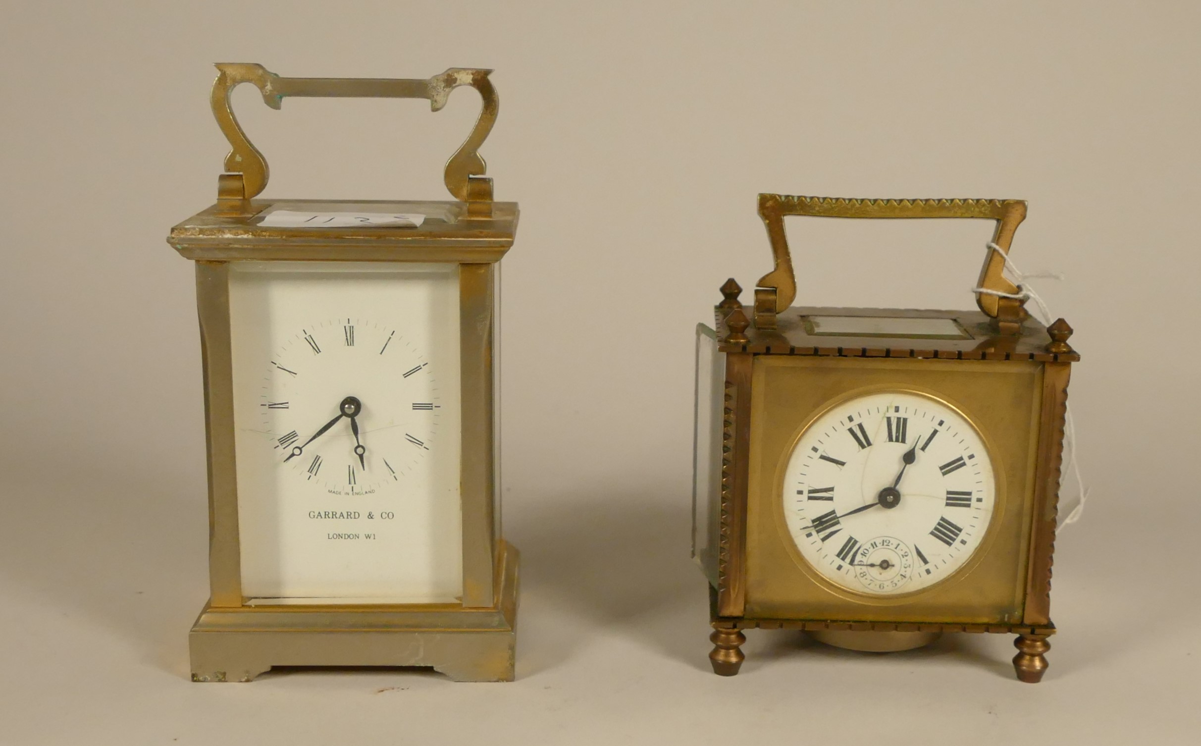 A Garrard & Co of London brass carriage clock, together a brass alarm carriage clock, the dial with