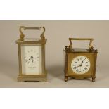 A Garrard & Co of London brass carriage clock, together a brass alarm carriage clock, the dial with