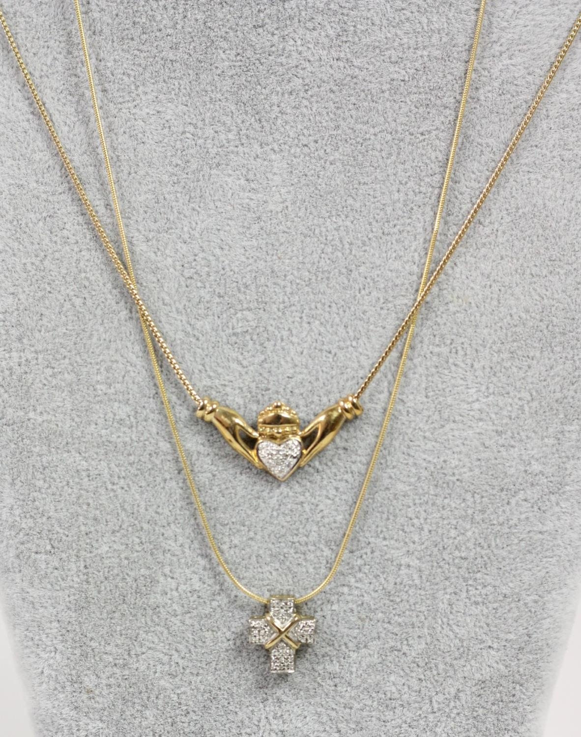A 9ct gold and diamond set cross pendant, chain and a 9ct gold and diamond set clasped heart