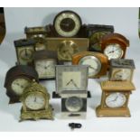 A collection of clocks to include, a Metamec quartz mantel clock, a Postilion mantel clock, together