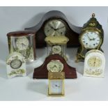 A collection of clocks to include, a Westminster England clock face, an Aynsley mantel clock, a